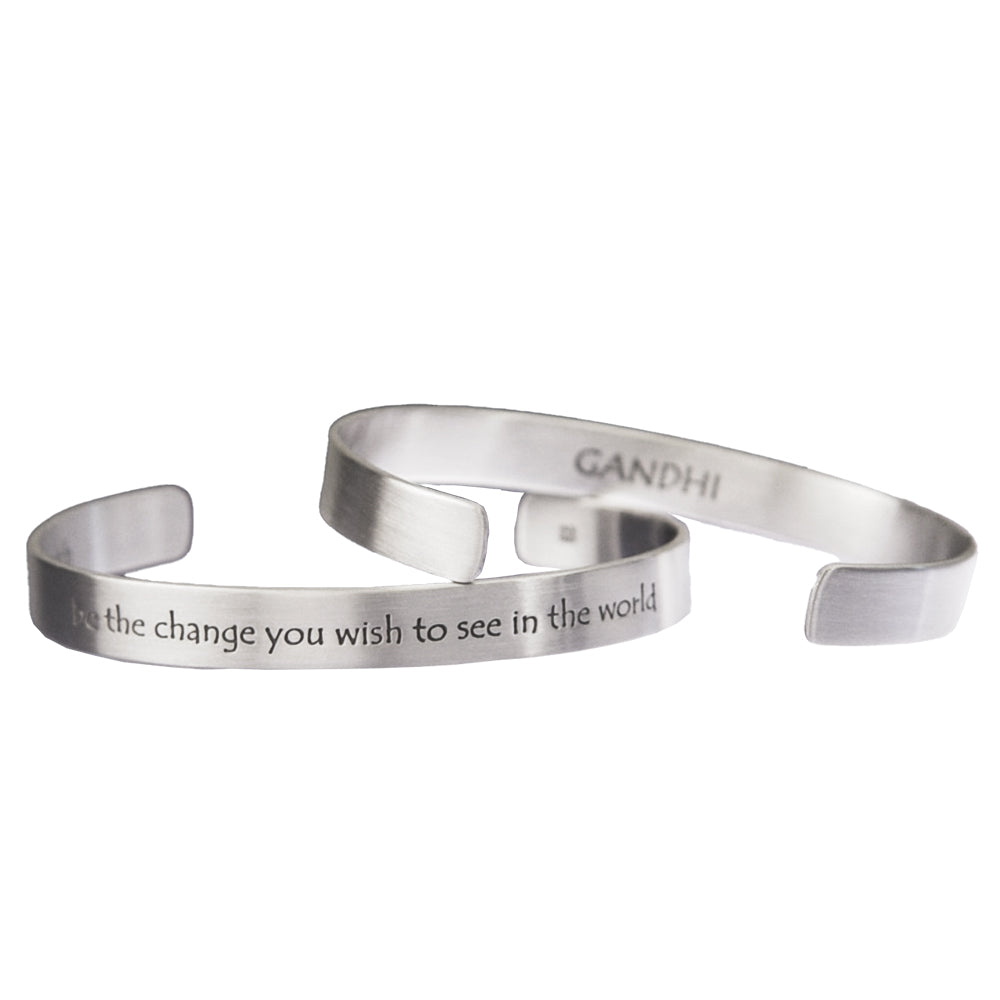 white gold cuff bracelet with Gandhi quote inscribed