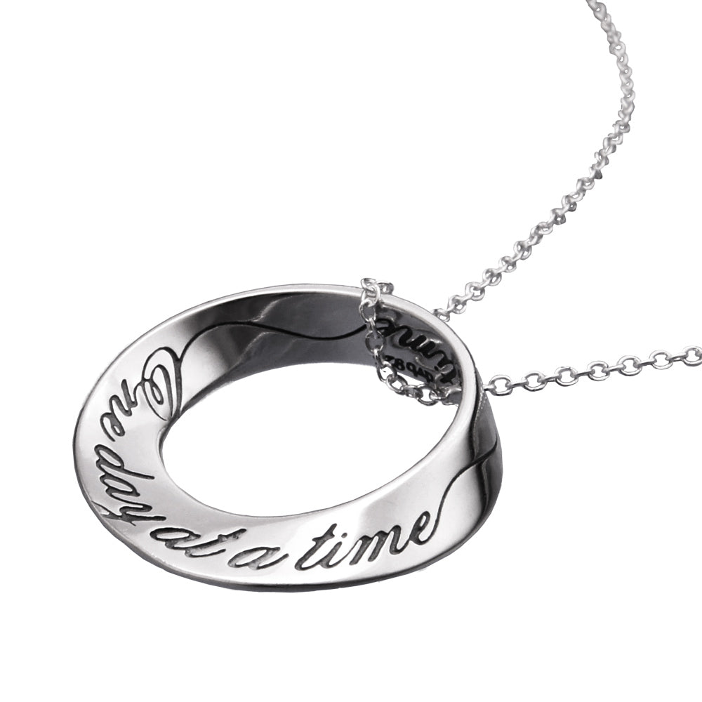 sterling silver mobius pendant with quote inscribed